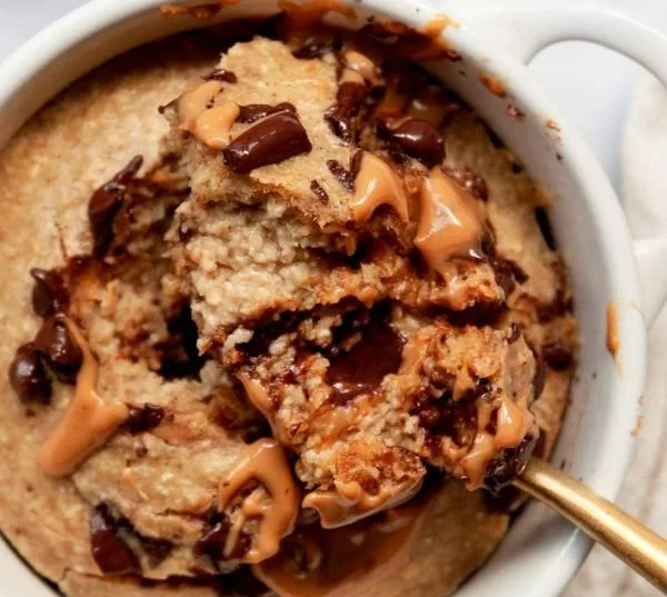 Delicious air fryer baked oats served in a bowl with fresh fruits.