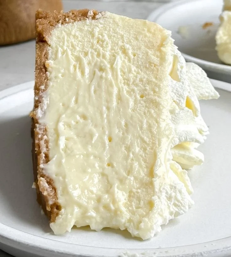 Delicious easy creamy cheesecake topped with fresh berries