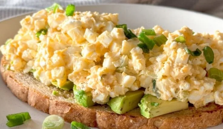 Delicious egg salad with cottage cheese served in a bowl