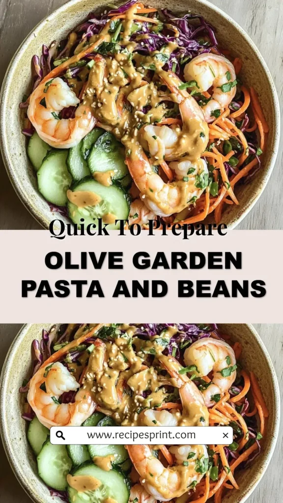 Bowl of Olive Garden Pasta and Beans with fresh herbs and ingredients