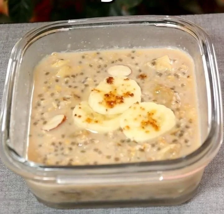 A bowl of delicious overnight oats topped with fresh berries and nuts