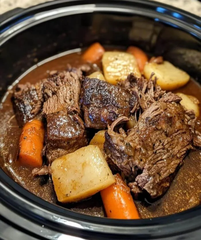 Delicious Slow Cooker 3 Packet Pot Roast served with vegetables