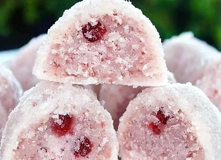 Delicious Cherry Snowball Cookies dusted with powdered sugar