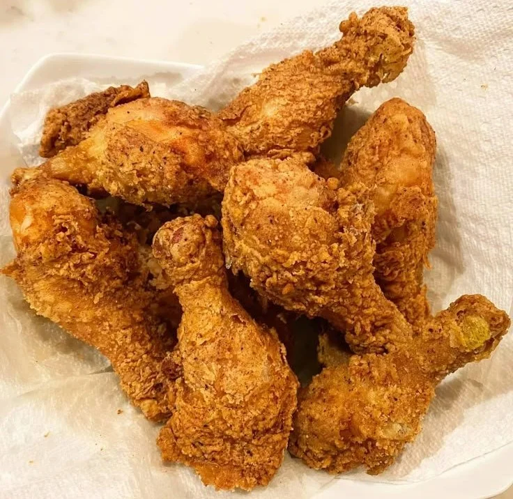 Deliciously crispy fried chicken served with sides