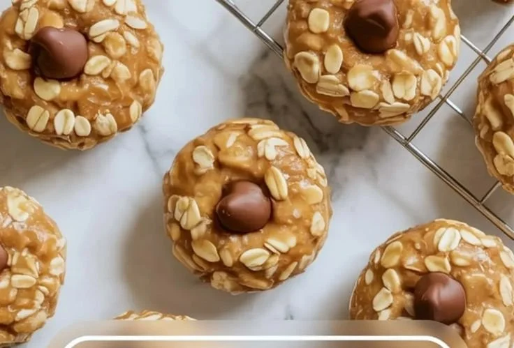 Healthy peanut butter oat cups in a rustic bowl with oats and peanuts