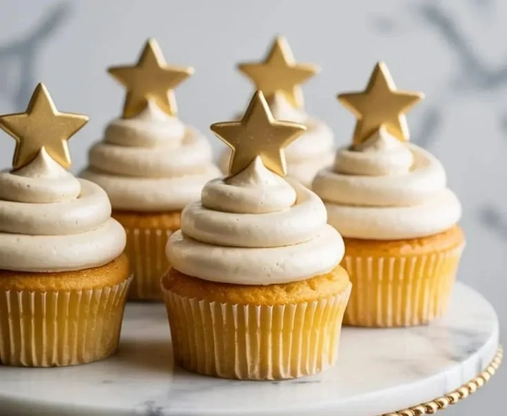 Delicious star-themed cupcakes with colorful frosting and decorations