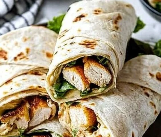Delicious Chicken Caesar Wraps with fresh ingredients and creamy dressing