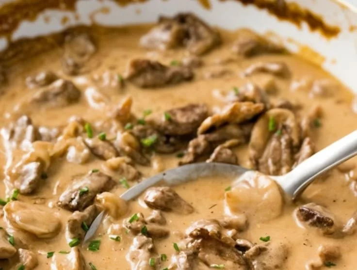 Gordon Ramsay's Beef Stroganoff dish served in a bowl with mushrooms and pasta