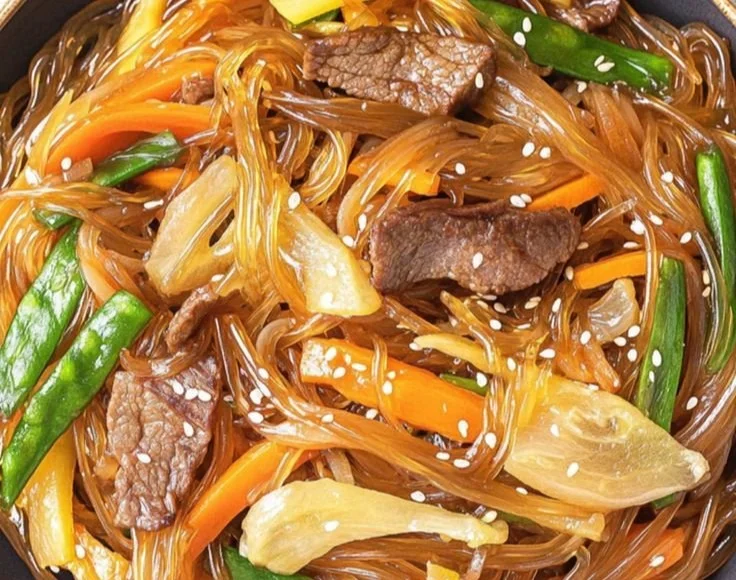 Delicious Korean glass noodle stir fry with vegetables and protein