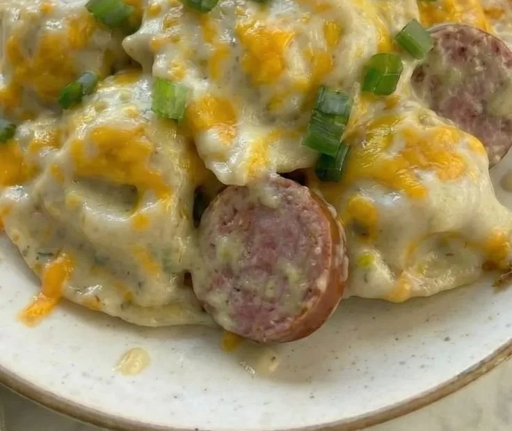 Slow cooker pierogi kielbasa casserole dish in a serving bowl