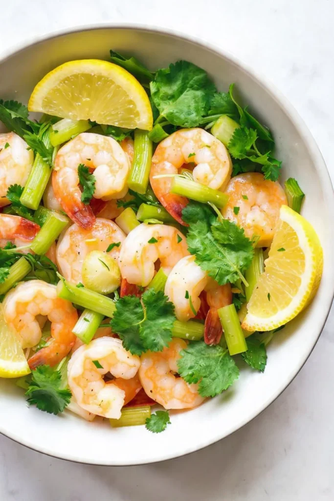 Healthy shrimp salad with fresh vegetables and a light dressing