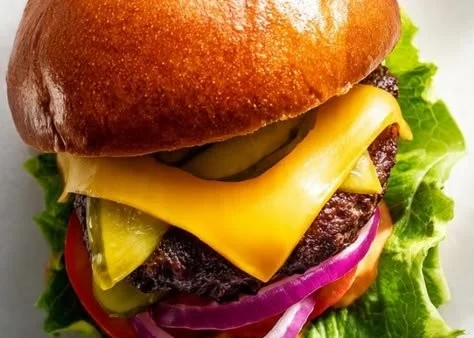 Delicious Classic Cheeseburger with fresh toppings and melted cheese