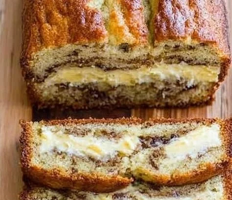 Delicious slice of cream cheese-filled banana bread on a plate