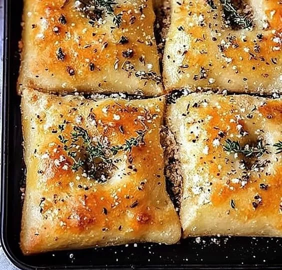 Delicious gluten-free focaccia bread, golden brown and freshly baked.