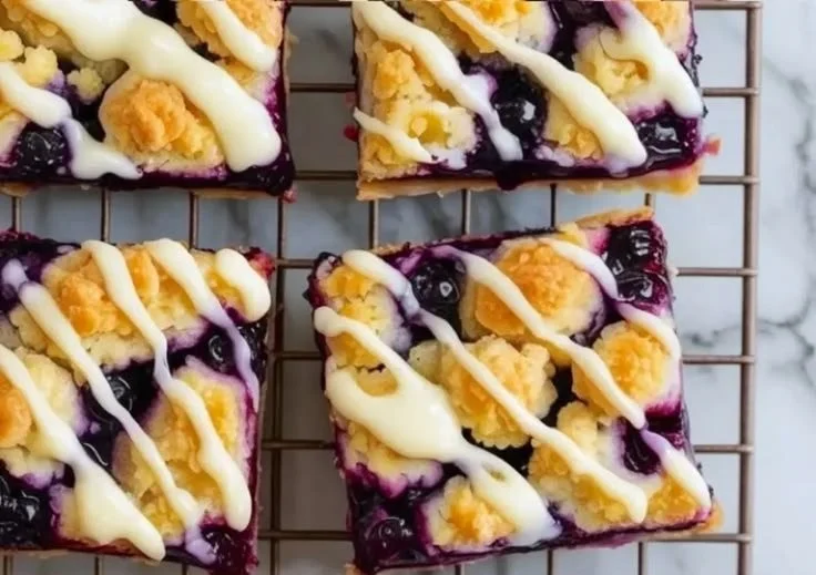 Delicious blueberry pie bars with juicy layers of sweet and tart blueberries.