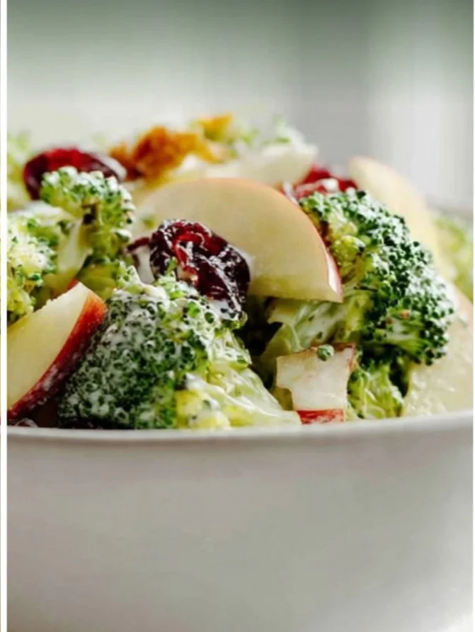 Bright Mediterranean broccoli salad with tomatoes, olives, and feta cheese